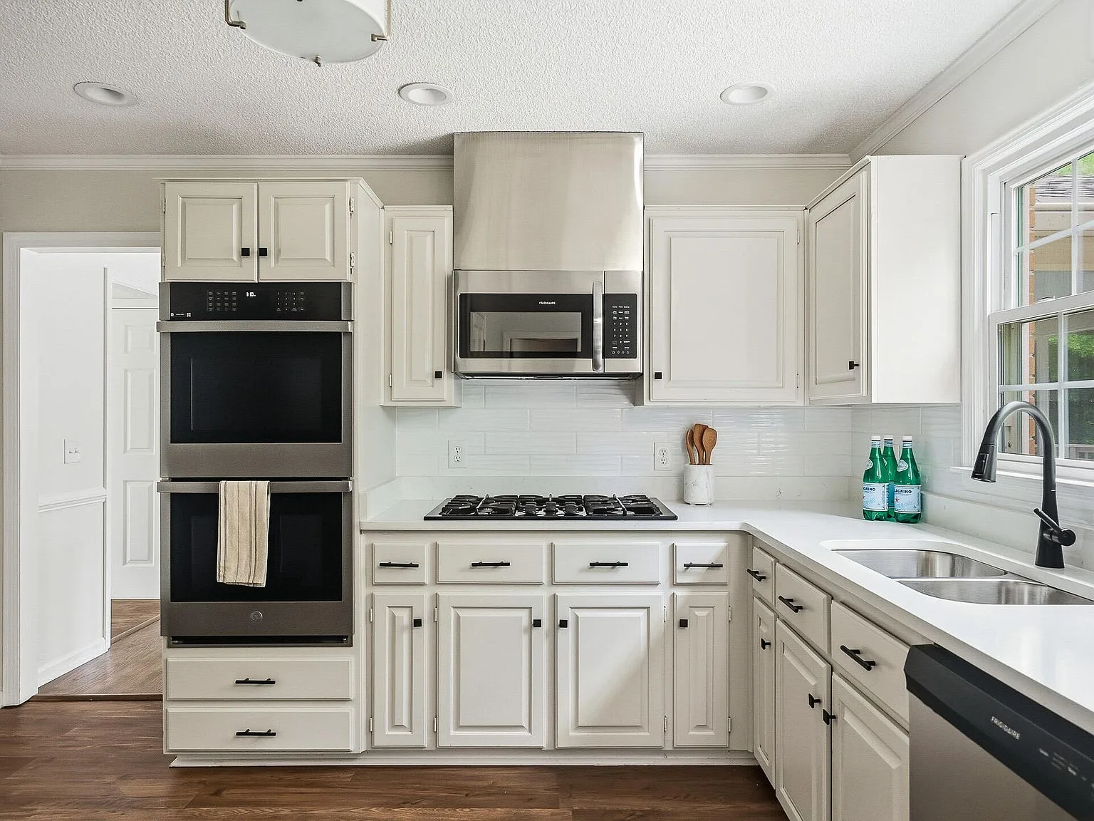 Renovated white kitchen in an Aiken, SC colonial home