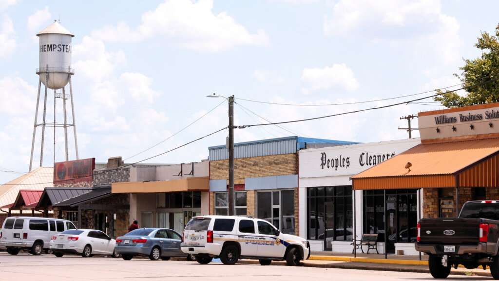 shot of downtown Hempstead, Texas with the iconic water tower that reads "Hempstead"