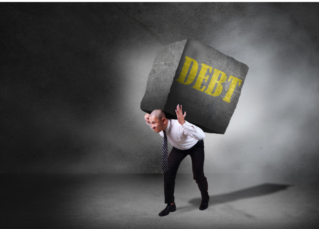 Man being crushed by a giant concrete block with the word debt on it. This man is facing foreclosure and doesn't know how he will escape the debt.