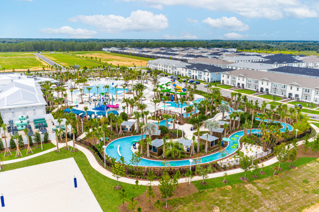 Lazy river and pool area at Windsor Cay Resort with surrounding vacation homes.