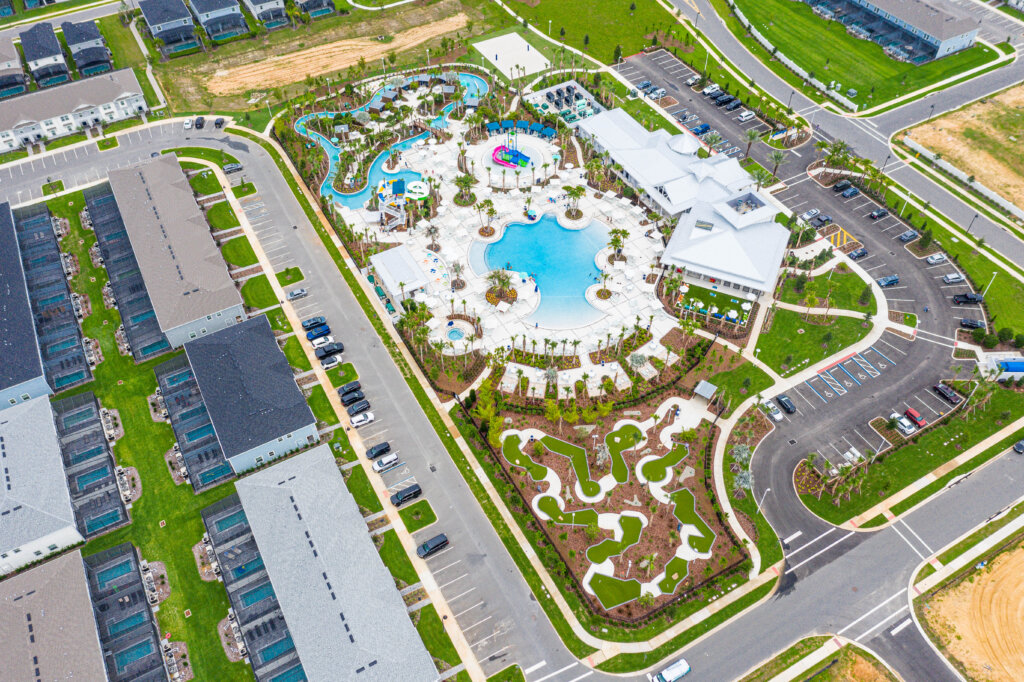 Top view of Windsor Cay Resort pool, mini golf, and vacation homes.