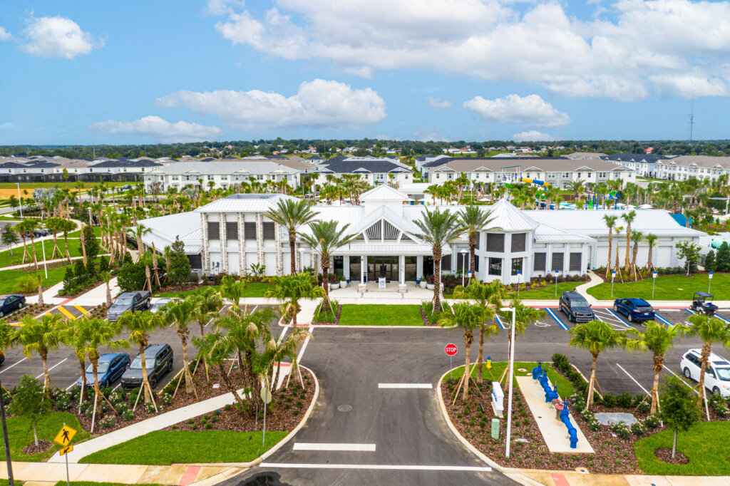 Front view of Windsor Cay Resort clubhouse with landscaped entrance.