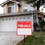 For Sale sign in front of a house in Kentucky