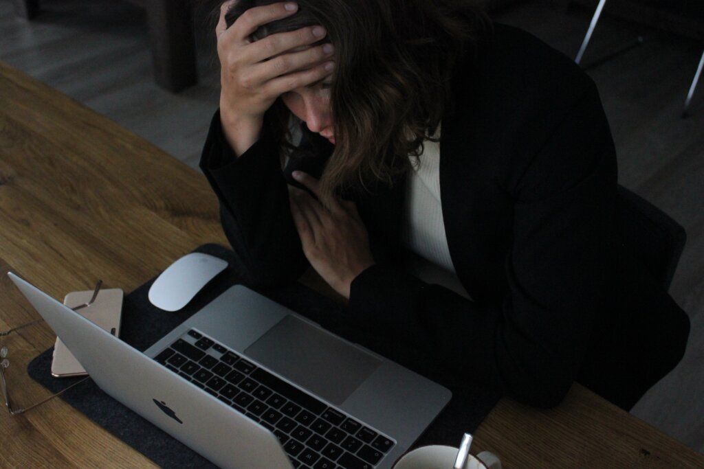 Woman thinking is a distressed homeowner