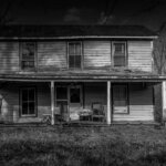 A black and white Photo of a Vacant Property