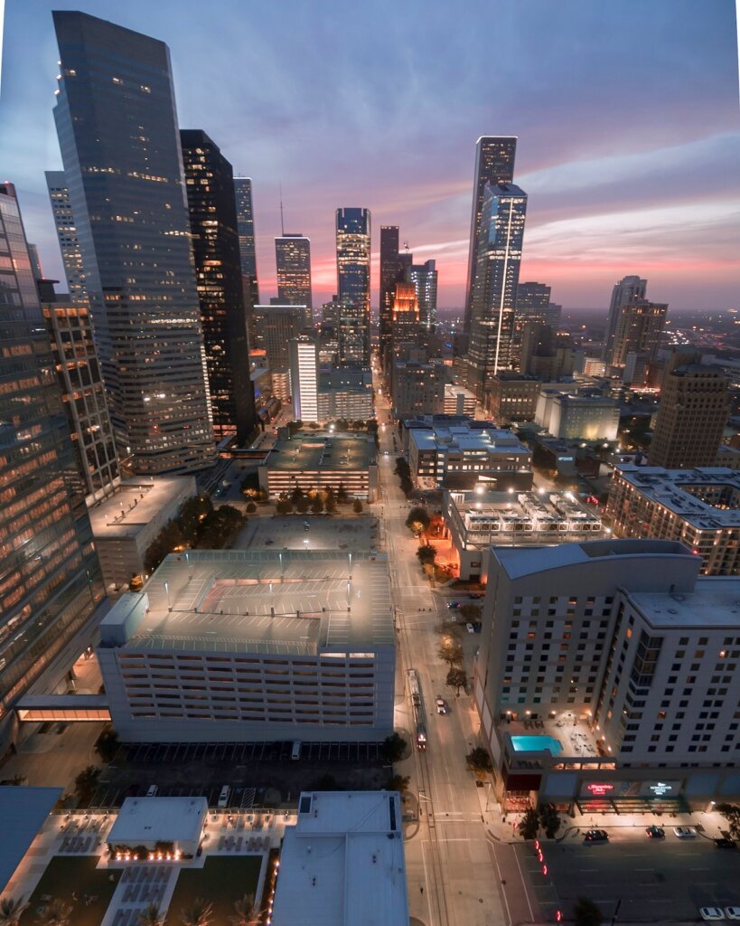 Houston Skyline showing some areas in which house buyers in Houston operate.