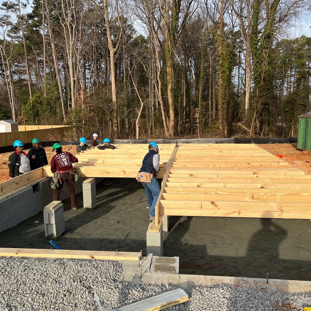 charlotte cardinal house buyers giving back to community team work
