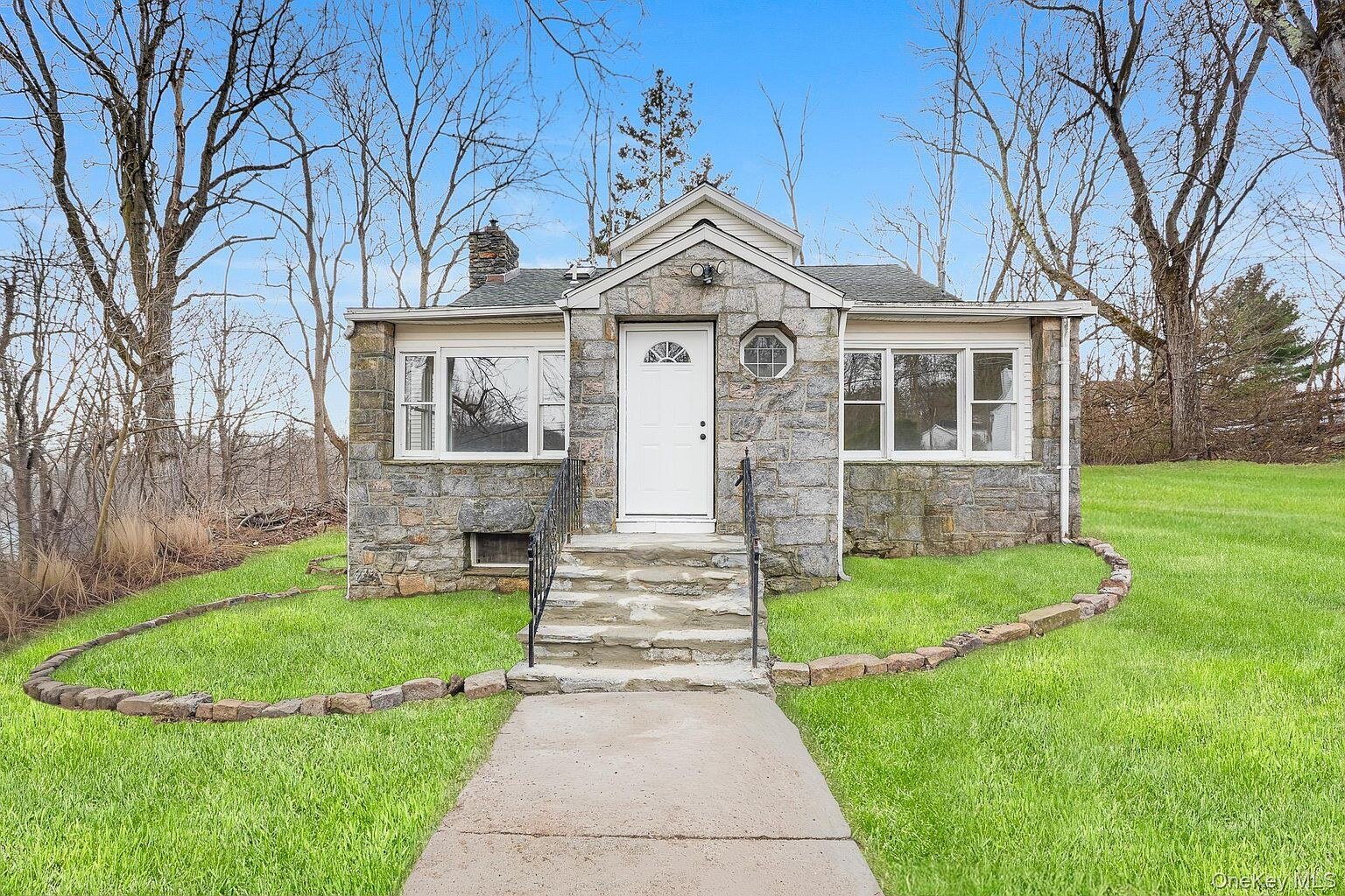 Renovated stone Cape Cod at 24 Amazon Rd, Carmel, NY
