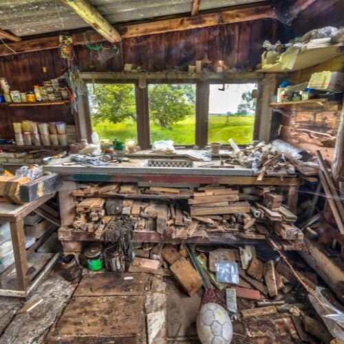 severely cluttered hoarder house interior in Oregon with debris and disorganized items