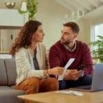 Couple discussing selling house during divorce in Portland