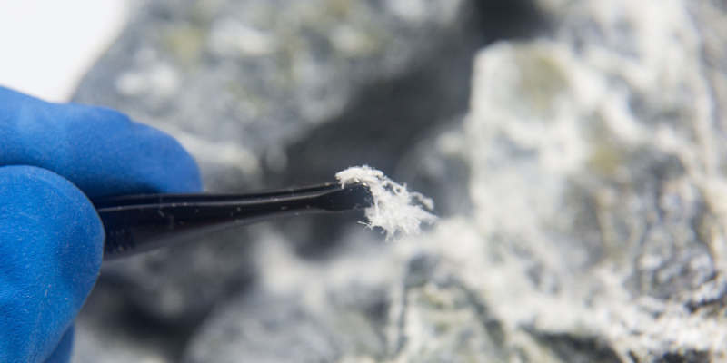 Sell house with asbestos Cleveland