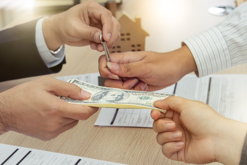 can i sell my house if i am behind on payments in Dallas