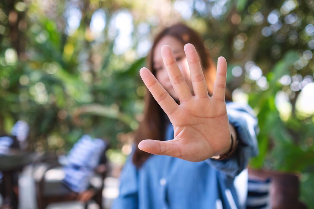 Woman indicating to stop