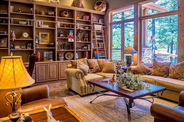 Living room of house for sale before and after water heater replacement.