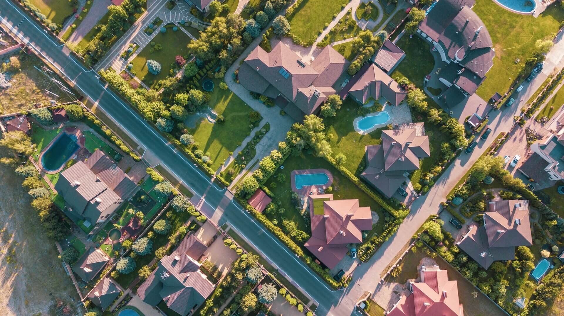 overhead view of suburban neighborhood on a sunny day