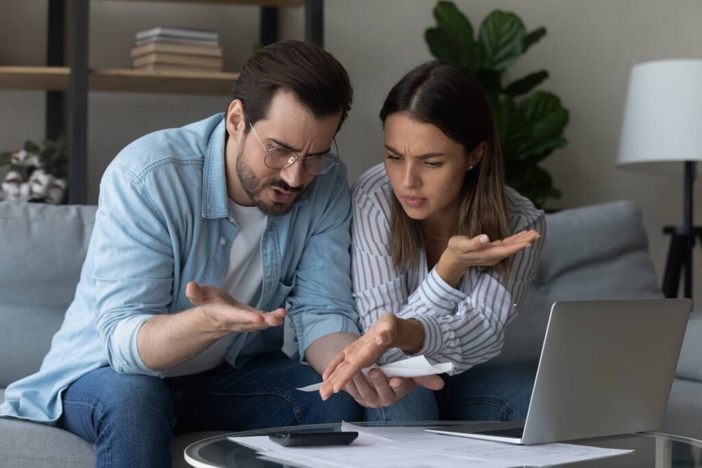 Two people trying to understand the Foreclosure Process in Florida