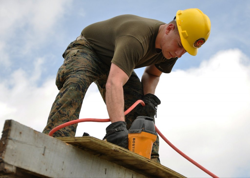 handy man on roof
