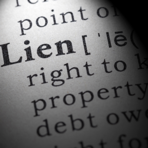 Selling land with a lien in Florida
