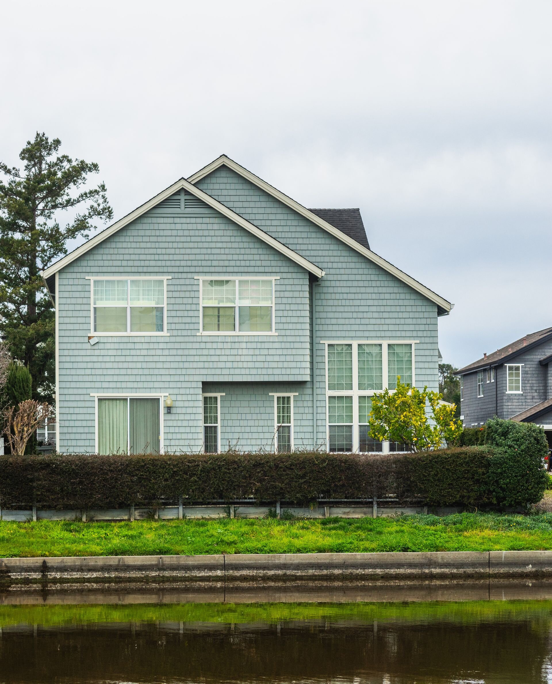 Ordinary two-story rental house in a Florida neighborhood