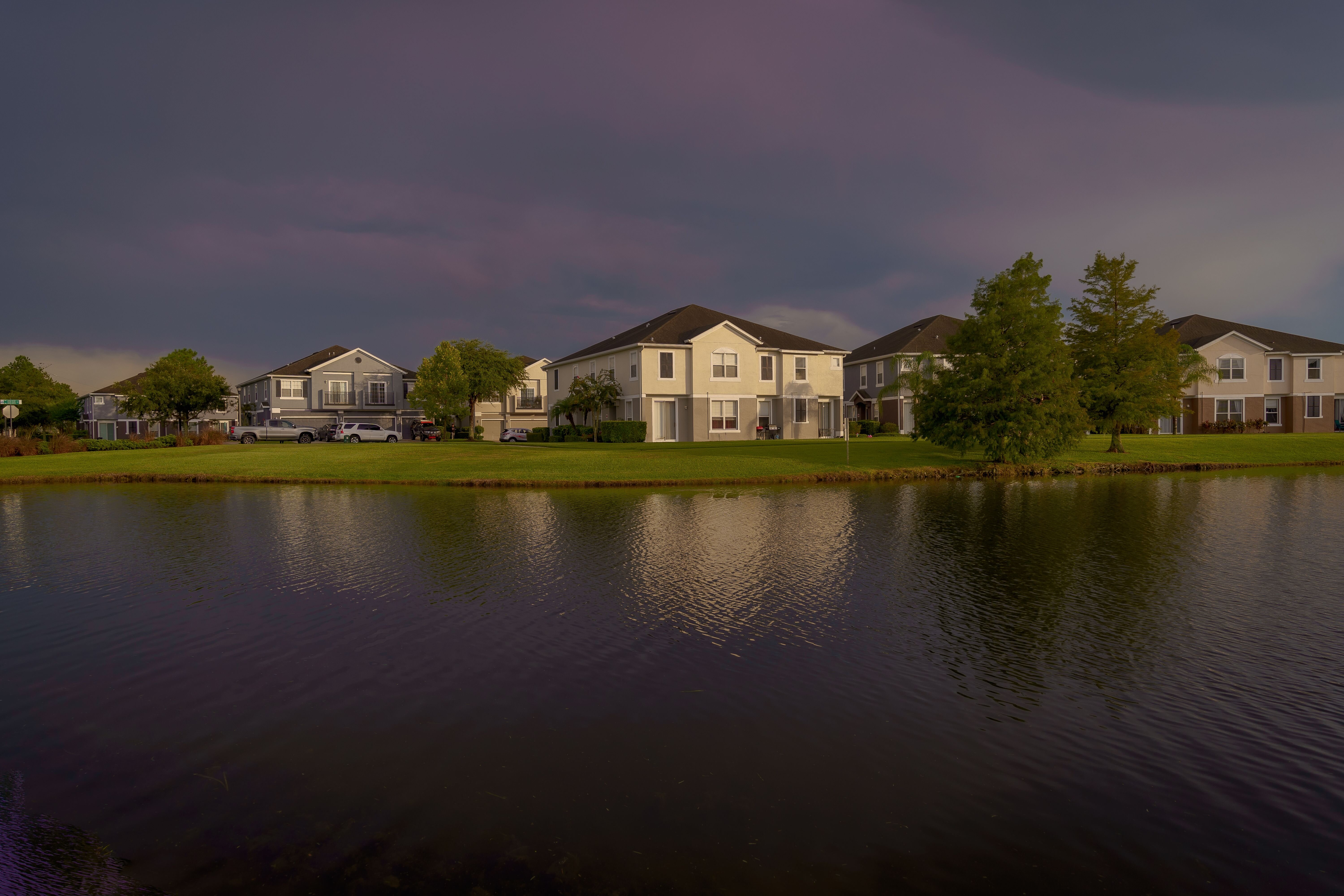 Palm Bay Florida homes at dusk near a lake