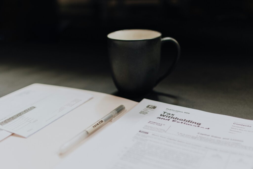Tax papers illustrating the tax implications of selling a home in Indiana