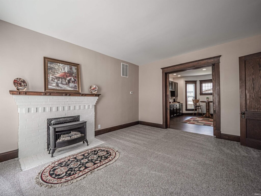 Charming fireplace in Owensville, In home.