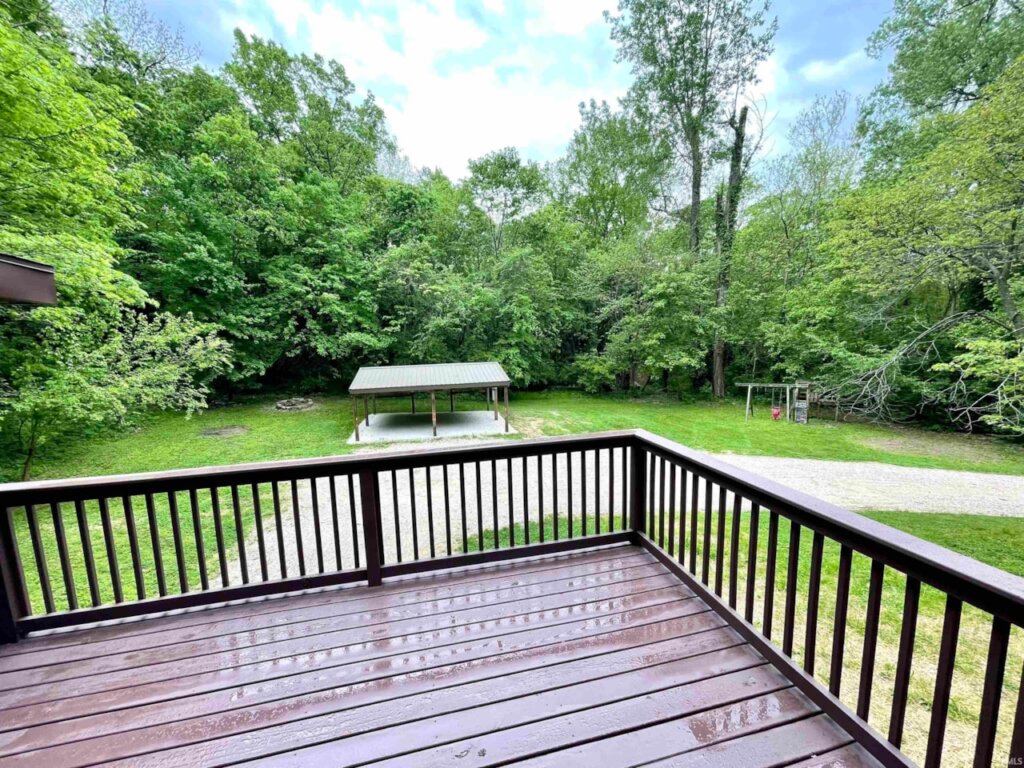 Deck overlooking large yard in Owensville paradise