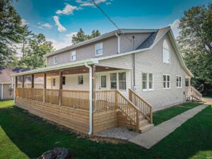 Covered back patio/porch in Holland home for sale.