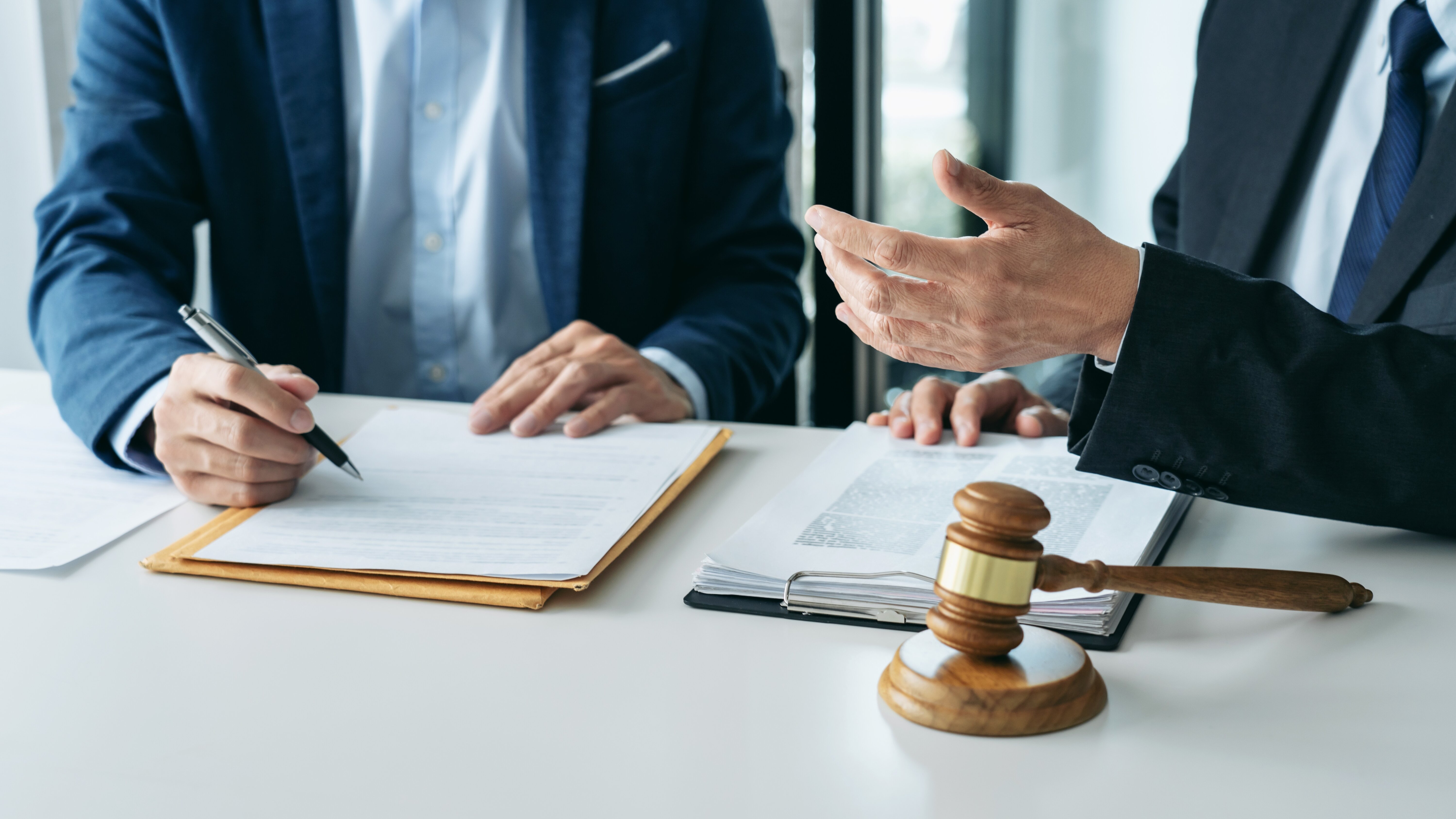 foreclosure lawyer with a client