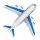 White airplane icon on a blue background, representing air travel or aviation.