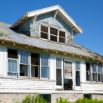 Abandoned Ohio house displaying visible code violations needing repair for sale.
