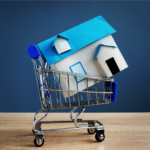 Model house in a shopping cart symbolizing the sale of real estate property in Ohio, representing a strategic approach to selling rental homes.