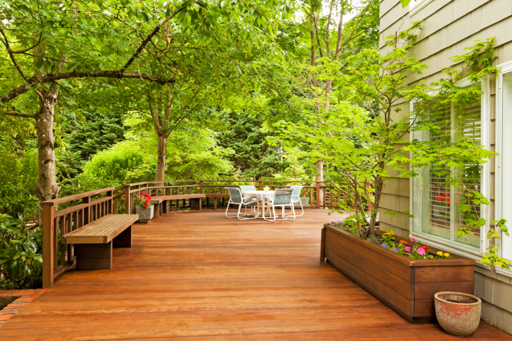 Spacious wooden deck addition with outdoor seating in an Ohio home, illustrating valuable exterior home improvement for increased property value.