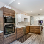 Modern kitchen remodel in Ohio home with high ROI features, including stainless steel appliances and granite countertops.