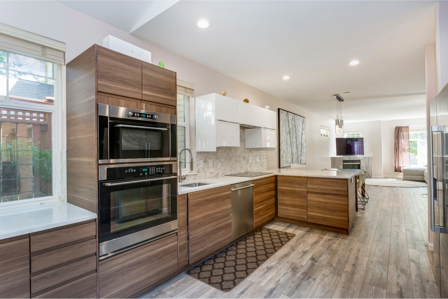 Modern kitchen remodel in Ohio home with high ROI features, including stainless steel appliances and granite countertops.