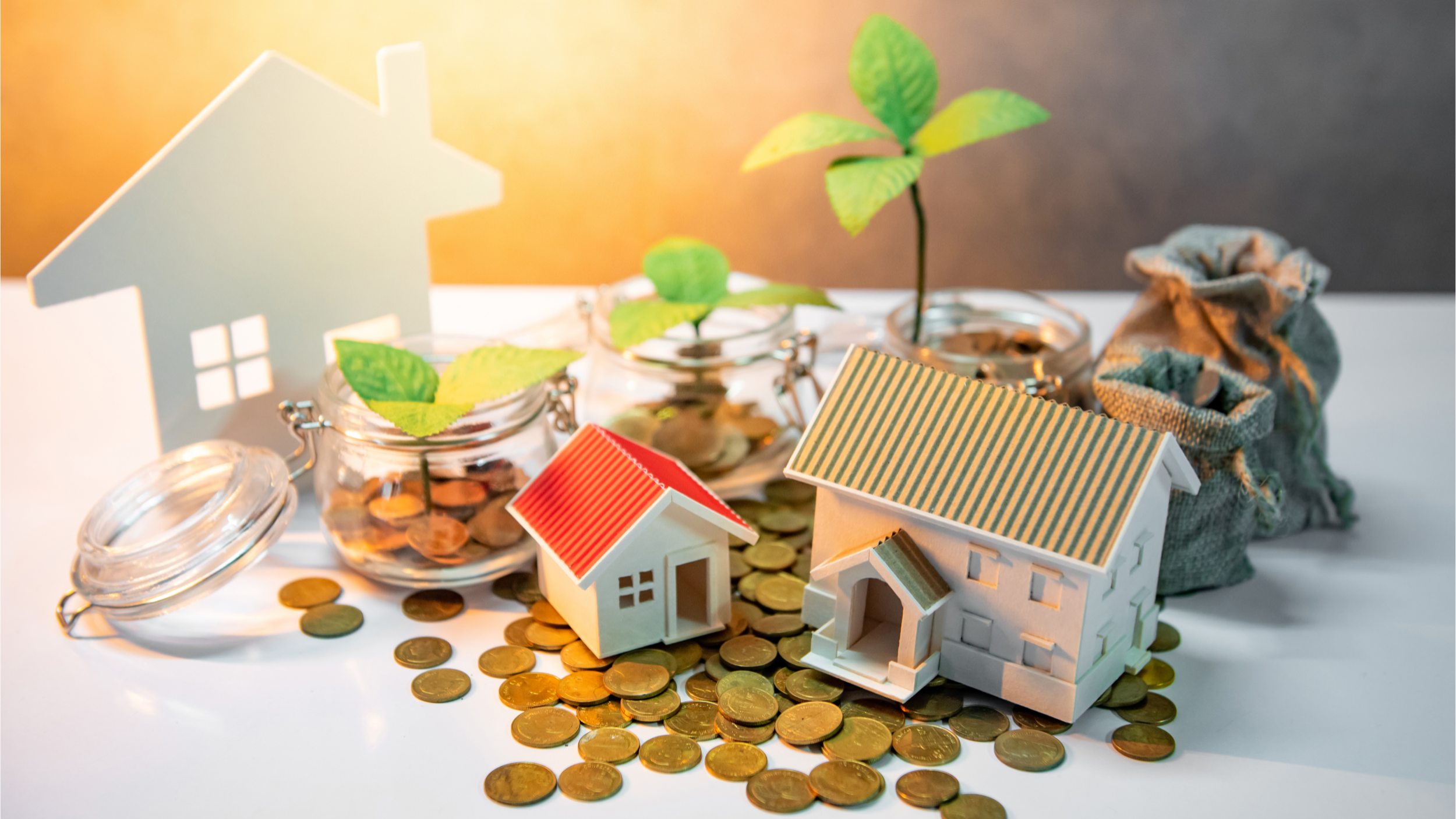 Affordable home selling in Cleveland with model houses and growing money savings concept.