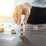 Real estate investor calculating property tax implications for selling rental homes in Ohio