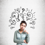 Thoughtful woman surrounded by question marks pondering the NAR settlement's impact on home selling.