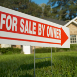 FSBO sign on front lawn indicating house for sale by owner in Dayton suburb