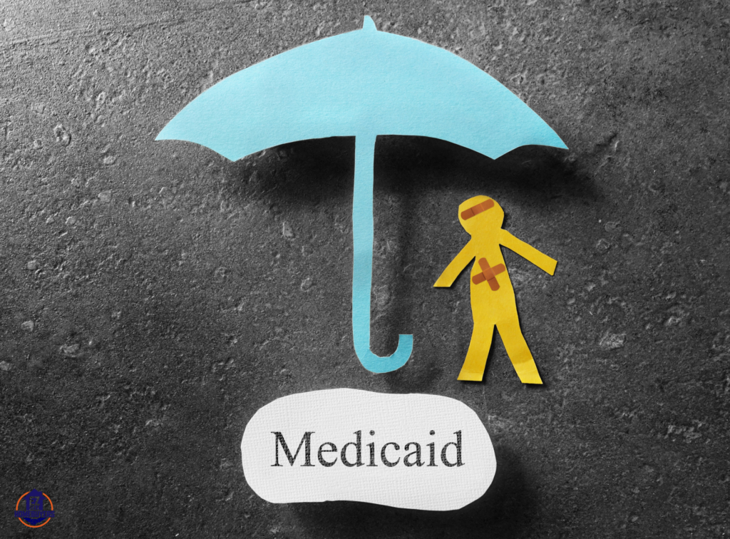 Medicaid coverage protection concept showing a cut-out figure under a blue umbrella with the word 'Medicaid', symbolizing financial safety in Ohio.