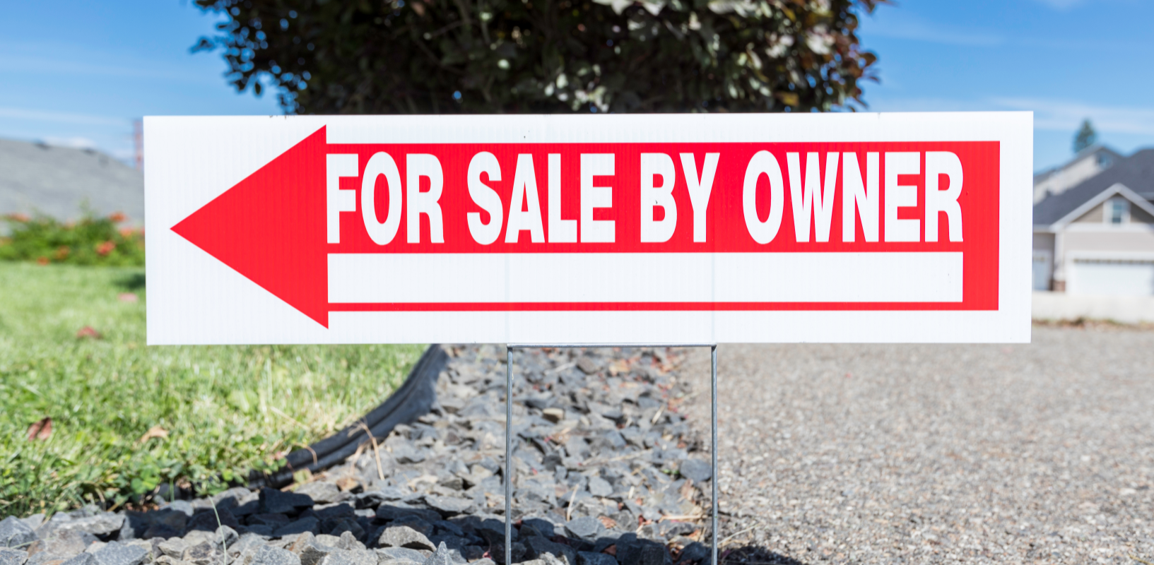For Sale By Owner sign in front of a house in Cincinnati, illustrating the process of selling a home without an agent to save on commissions and have more control over the sale.
