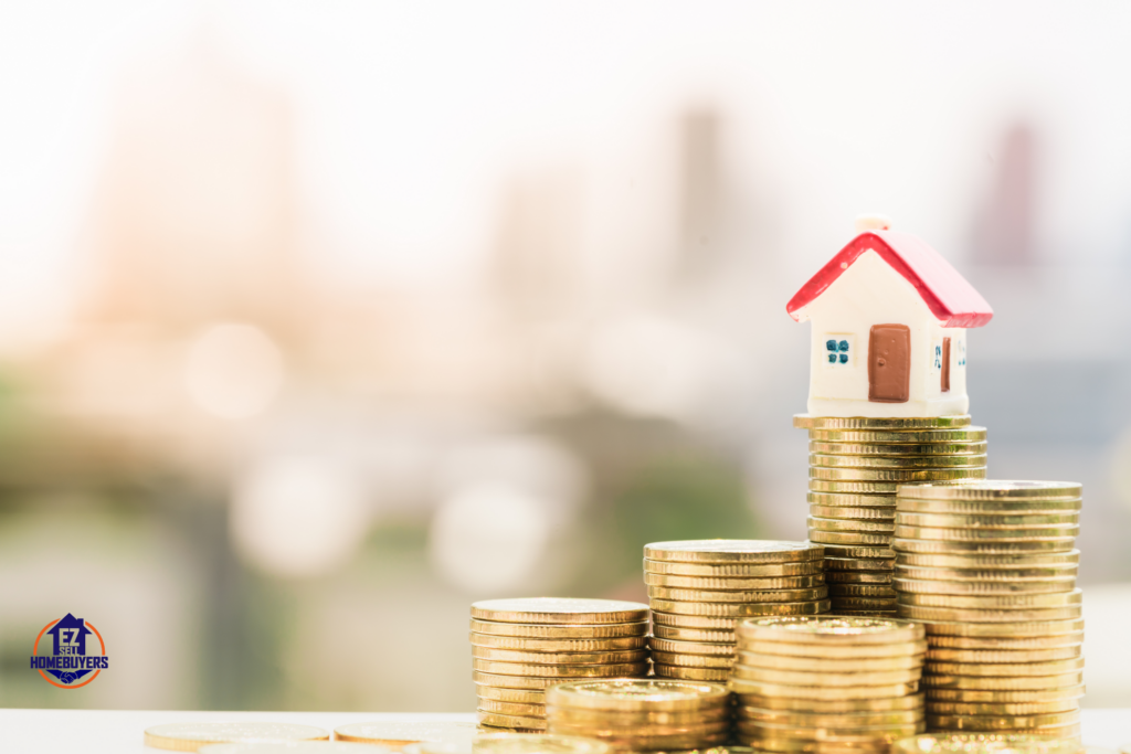 Investing in Dayton, Ohio real estate: a miniature house sits atop stacks of gold coins, symbolizing the potential for strong returns and stable investment in the affordable housing market. Explore the benefits of investing in single-family rentals in Dayton, supported by robust economic indicators and low vacancy rates.