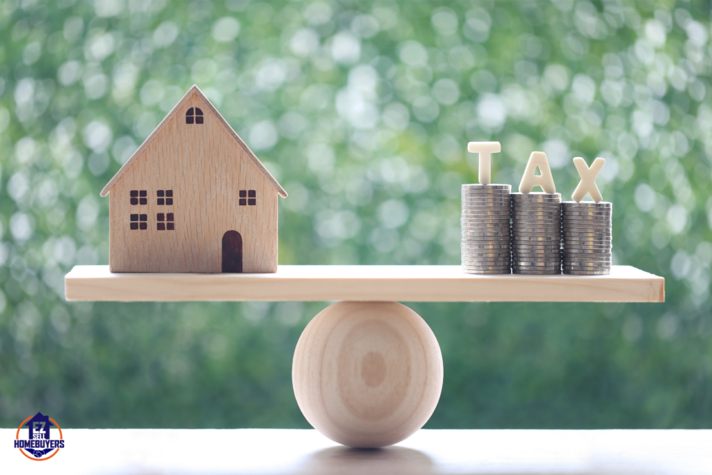 Wooden house model balanced with stacked coins labeled 'TAX' representing strategies to lower property taxes in Ohio, illustrating savings methods such as appeals and exemptions.