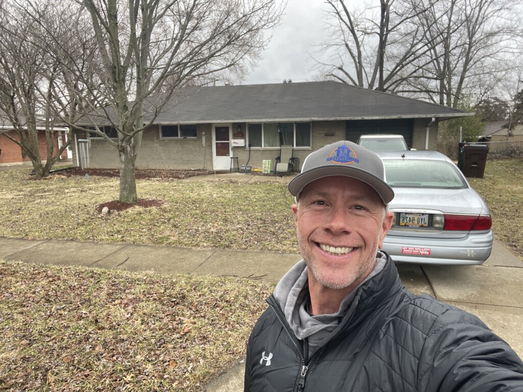 Mike Wall in front of a Kettering home saved from foreclosure — outdated property sold as-is for cash in Dayton, Ohio
