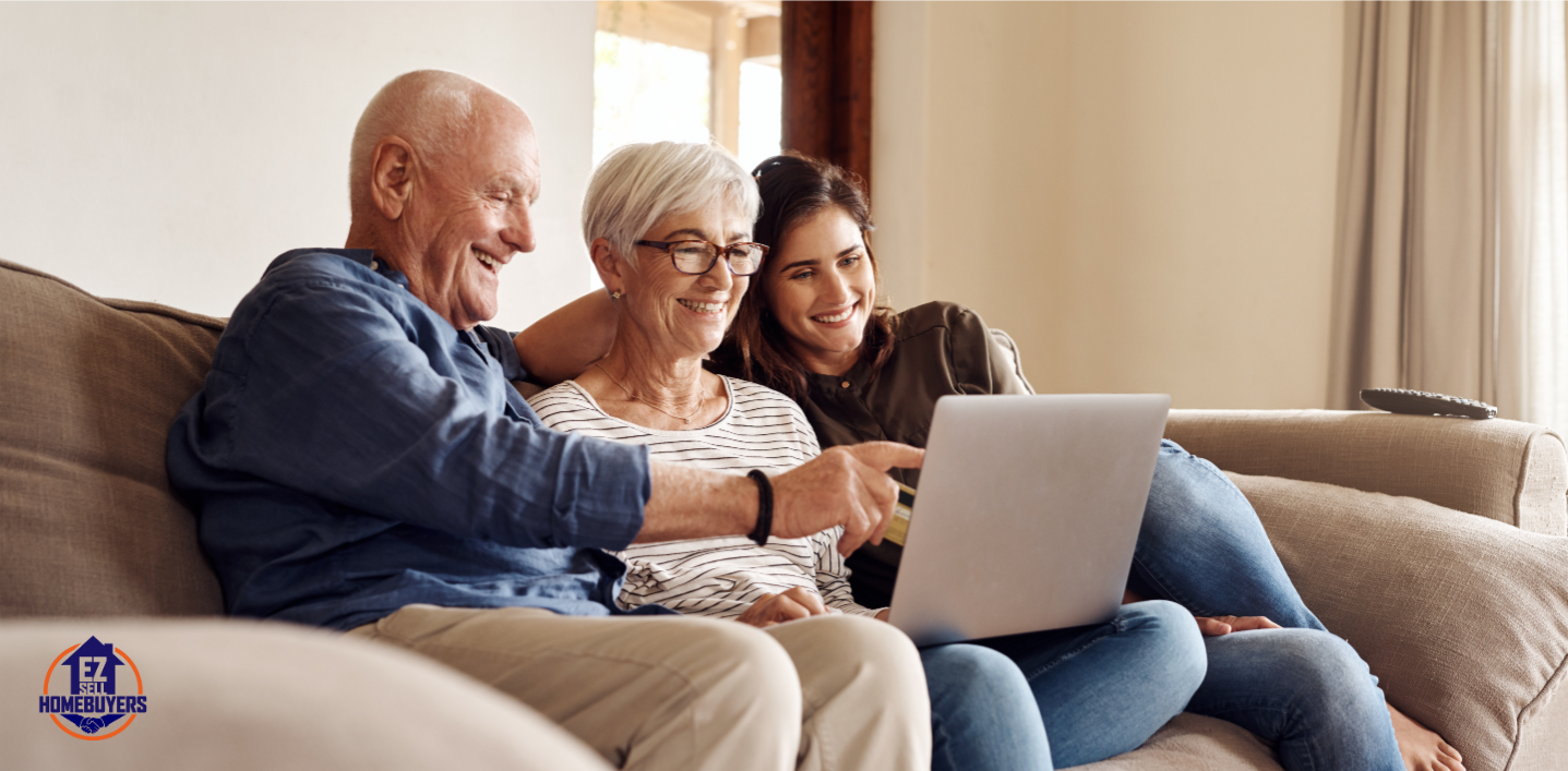 Happy elderly couple with family using laptop to explore estate planning options in Ohio
