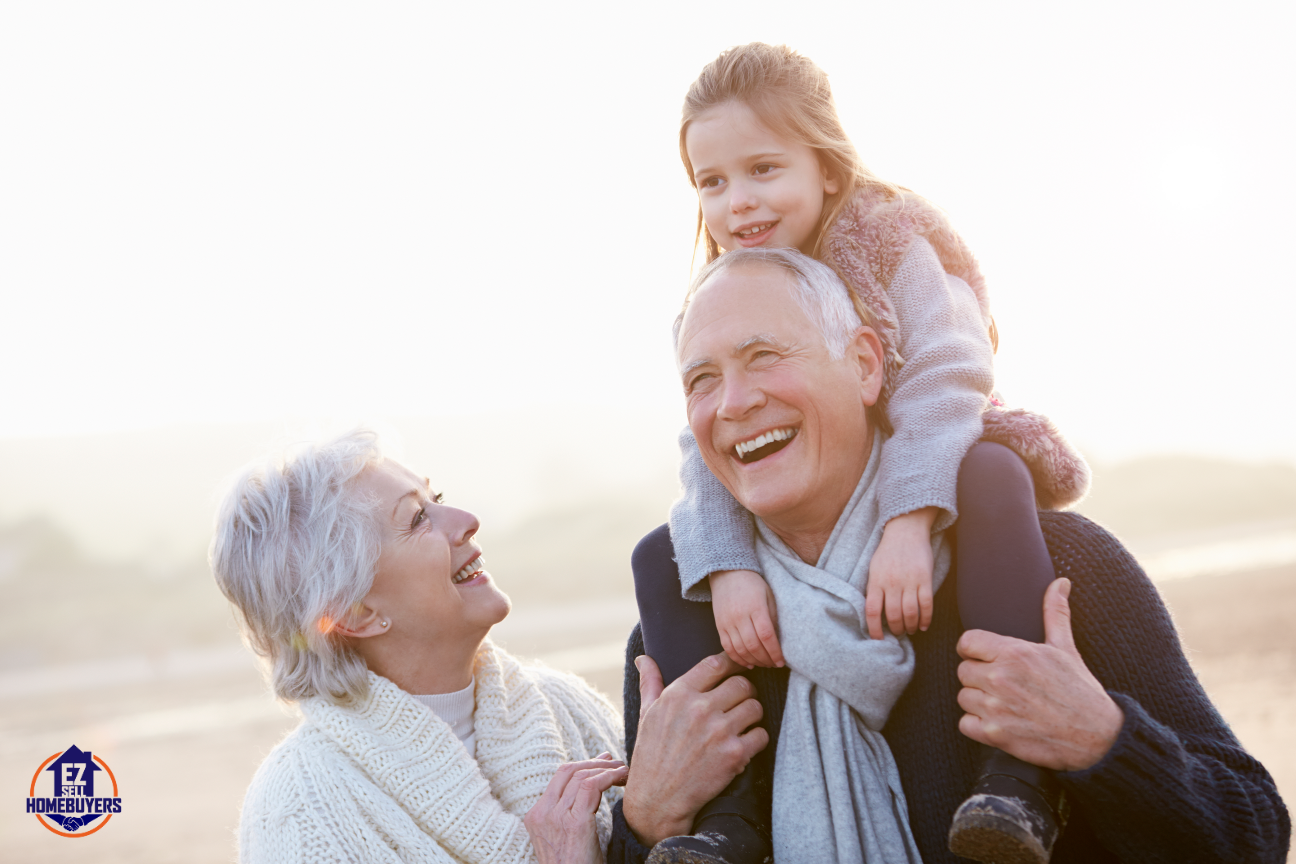 Happy grandparents with granddaughter smiling outdoors, symbolizing peace after probate in Ohio