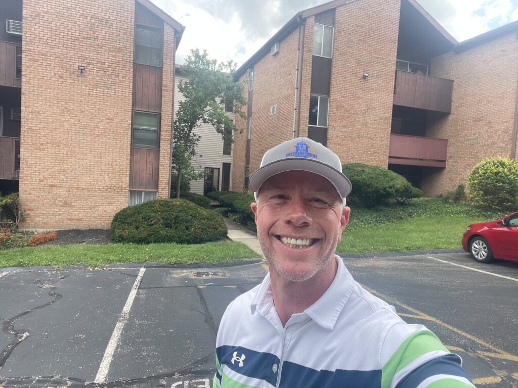 EZ Sell Homebuyers owner in front of a recently purchased condo at 4902 Chalet Drive in Cincinnati Ohio sold for cash as-is
