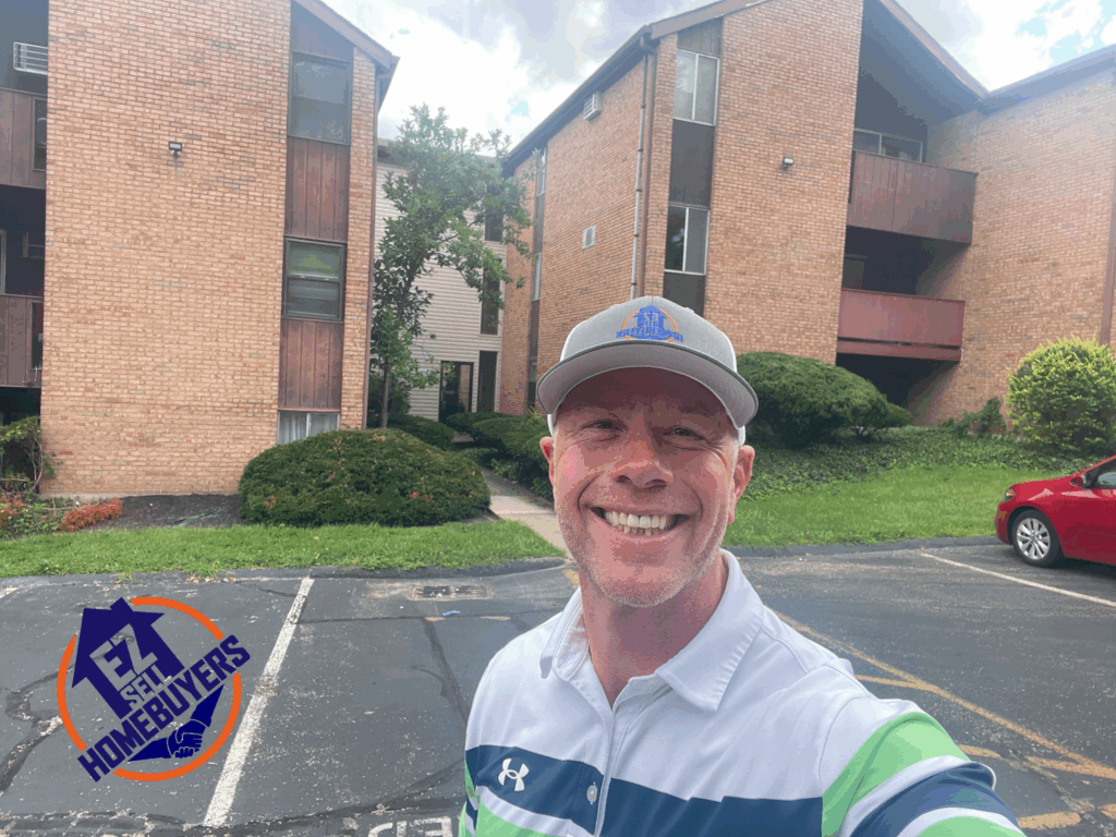 EZ Sell Homebuyers owner in front of a recently purchased condo at 4902 Chalet Drive in Cincinnati Ohio sold for cash as-is