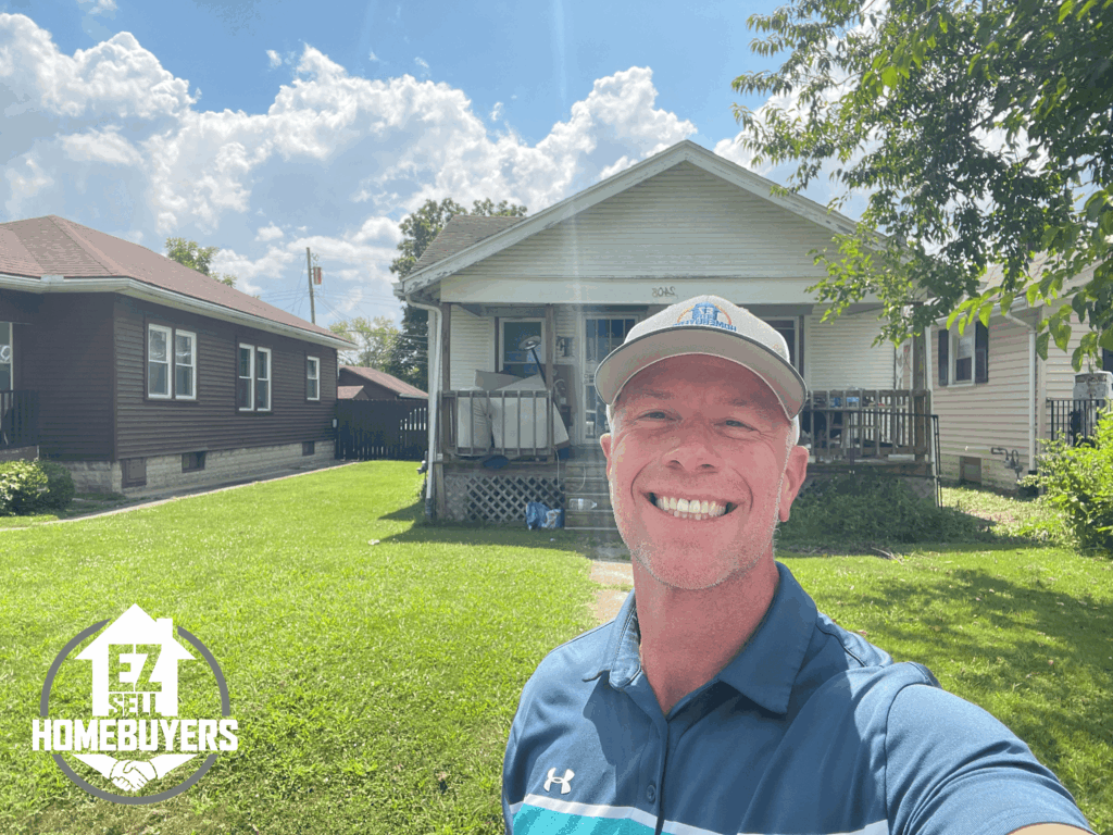 Mike Wall, Dayton Ohio home buyer, standing in front of a property purchased by EZ Sell Homebuyers