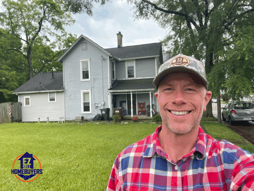Mike Wall of EZ Sell Homebuyers at a house he bought for cash on Old Main in Miamisburg, Ohio, from a senior seller.